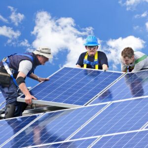 A team replacing solar panels